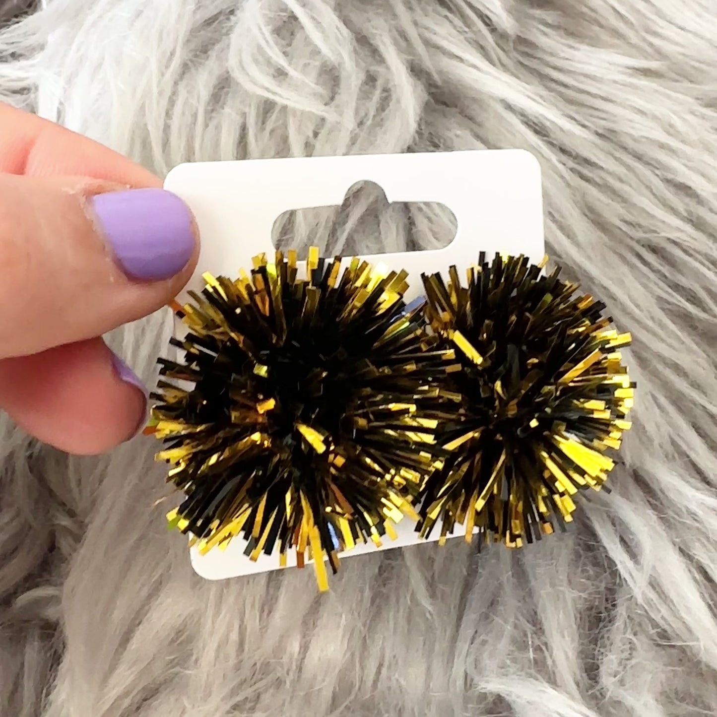 Load and play video in Gallery viewer, Black and gold Pom studs
