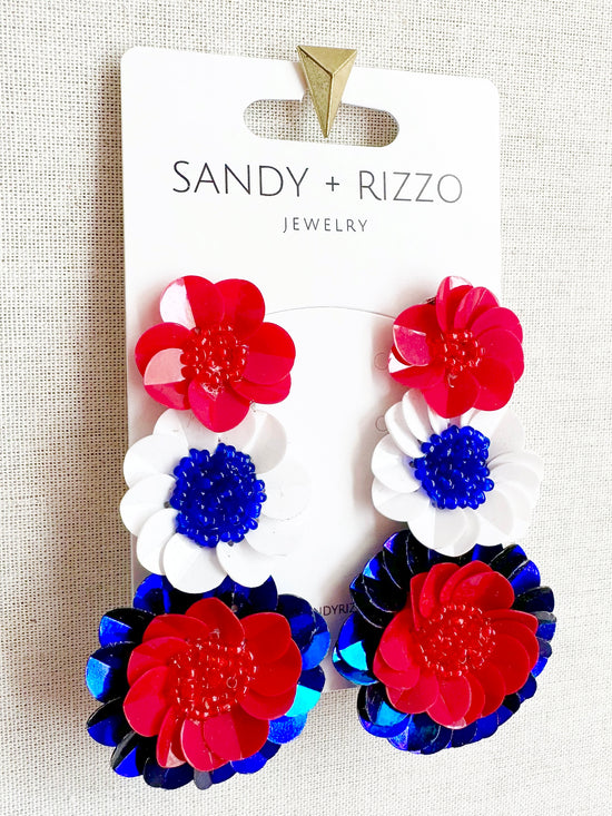 Red, white and blue triple flower